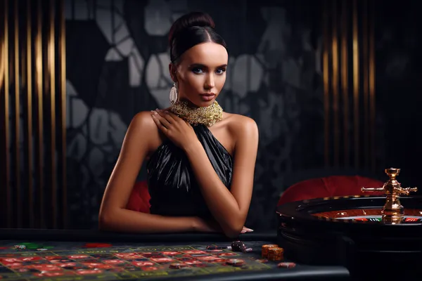 9777BEF Slots — Thousands of exciting themes and jackpots A stylish woman beside vibrant slot machines displaying glowing sevens, showcasing the variety of top slots at 9777BEF.